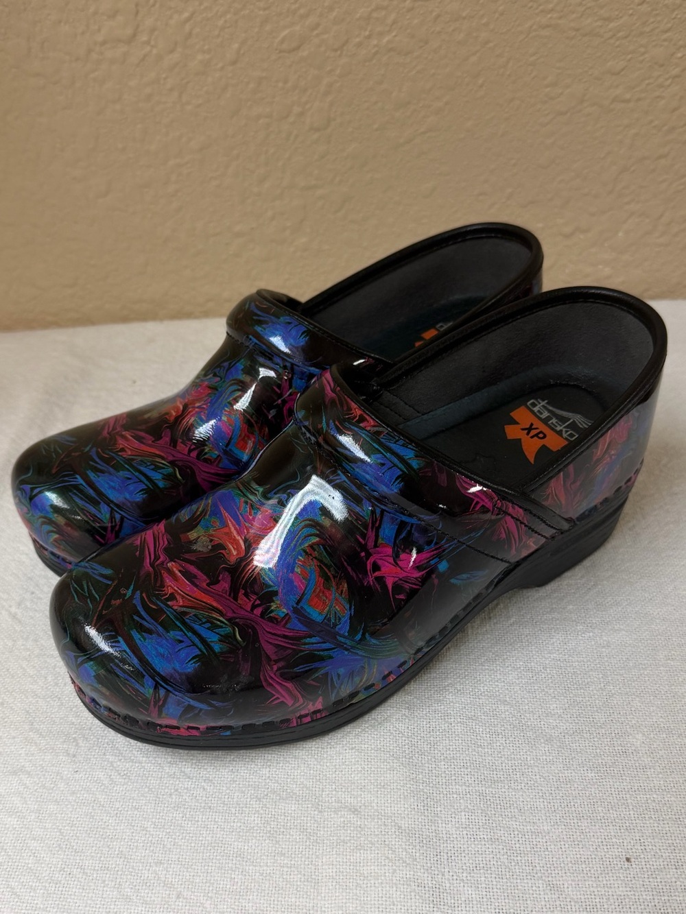 Dansko Black Patent Clogs with Multicolor Swirl (Blue, Pink, Purple)